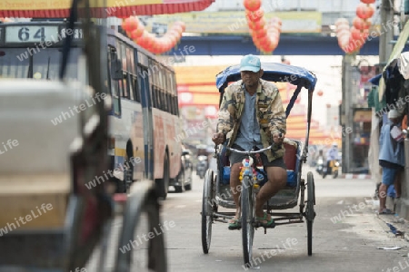 Bicycle Ricksha Taxis at the morning Market in Nothaburi in the north of city of Bangkok in Thailand in Southeastasia.