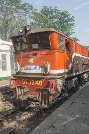 a train of the Yangon circle train in a trainstation near the City of Yangon in Myanmar in Southeastasia.