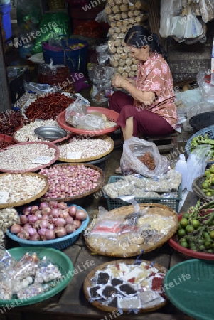 the food market at the Maeklong Railway Markt at the Maeklong railway station  near the city of Bangkok in Thailand in Suedostasien.