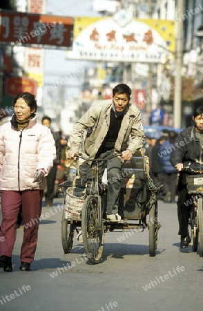 a bicycle transport in the City of Shanghai in china in east asia. 