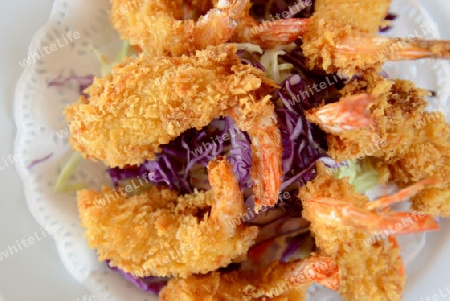 Shrimp with salad in a restaurant at the Hat Railay Leh Beach at Railay near Ao Nang outside of the City of Krabi on the Andaman Sea in the south of Thailand. 