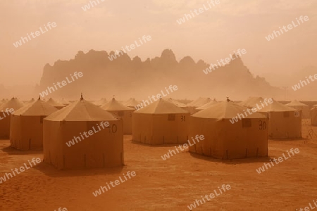 a Sandstorm in the Landscape of the Wadi Rum Desert in Jordan in the middle east.