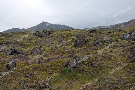 Der S?dwesten Islands, Obsidian Lavafeld Laugahraun vor Vulkan-Kulisse in Landmannalaugar