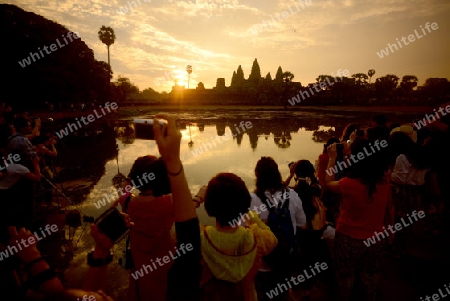 Tourists at the Angkor Wat in the Temple City of Angkor near the City of Siem Riep in the west of Cambodia.