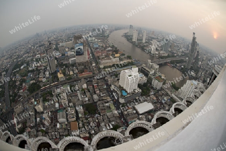 The Skyline view from the Sky Bar at the Riverside Aerea in the city of Bangkok in Thailand in Southeastasia.