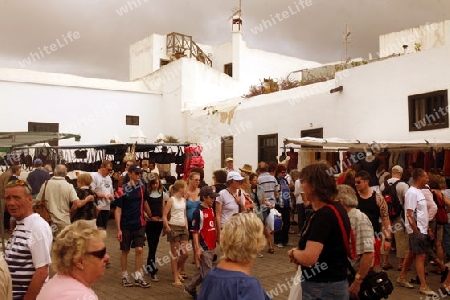 the sunday market in the old town of Teguise on the Island of Lanzarote on the Canary Islands of Spain in the Atlantic Ocean. on the Island of Lanzarote on the Canary Islands of Spain in the Atlantic Ocean.
