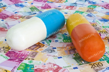 Tabletten auf Euroscheine