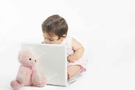 Stock Photo:  Baby Girl at Laptop Computer