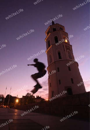 The old Town of the City Vilnius with the clocktower and the Johanneschurch  in the Baltic State of Lithuania,  