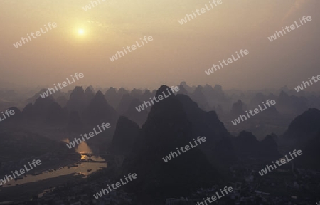 the landscape at the Li River near Yangshou near the city of  Guilin in the Province of Guangxi in china in east asia. 