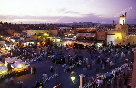 The Streetfood and Nightlife at the Djemma del Fna Square in the old town of Marrakesh in Morocco in North Africa.
