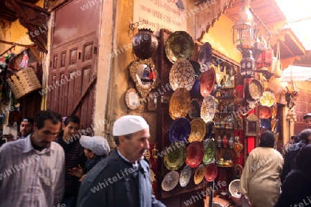 a smal Marketroad in the Medina of old City in the historical Town of Fes in Morocco in north Africa.