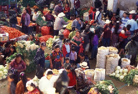 people in traditional clotes at the Market in the Village of  Chichi or Chichicastenango in Guatemala in central America.   