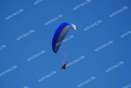 Man with a hang glider