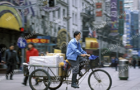 a bicycle transport in the City of Shanghai in china in east asia. 