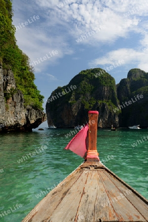 a Boat on the way to Maya Beach  near the Ko Phi Phi Island outside of the City of Krabi on the Andaman Sea in the south of Thailand. 