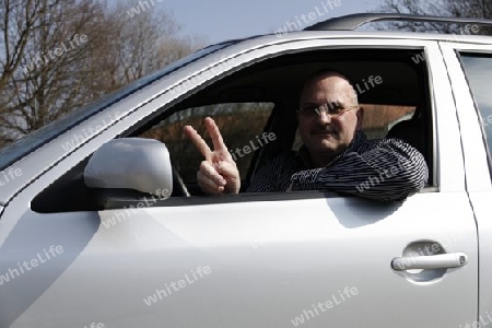 friendly car driver on the road