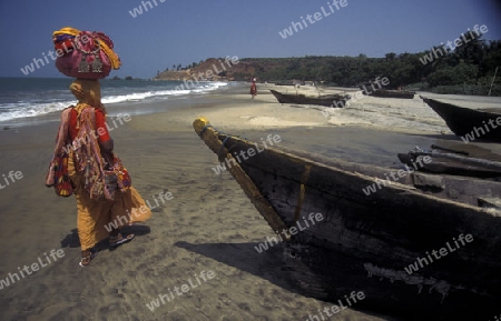 a Indian Saler at the beach of Colva in the Province Goa in India.