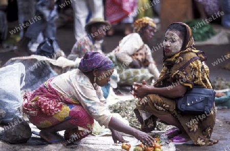 women at the Market in the city of Moutsamudu on the Island of Anjouan on the Comoros Ilands in the Indian Ocean in Africa.   