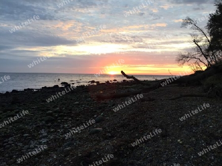 Sonnenuntergang am Wasser-Fehmarn 