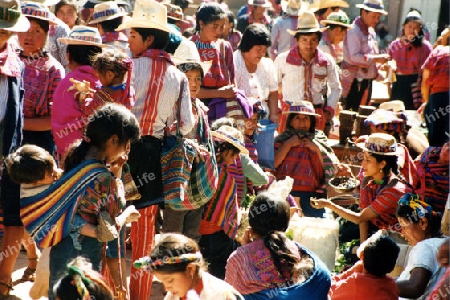 people in traditional clotes in the Village of  San Cristobal in Guatemala in central America.   