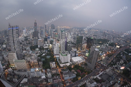 The Skyline view from the Sky Bar at the Riverside Aerea in the city of Bangkok in Thailand in Southeastasia.