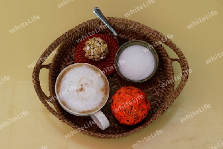 a coffee in a coffee shop in the town of Nyaungshwe at the Inle Lake in the Shan State in the east of Myanmar in Southeastasia.