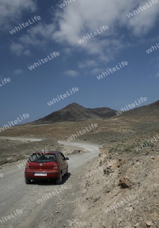 The Road in the Jandia Natural Parc on the south of the Island Fuerteventura on the Canary island of Spain in the Atlantic Ocean.