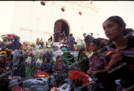 people in traditional clotes at the Market in the Village of  Chichi or Chichicastenango in Guatemala in central America.   