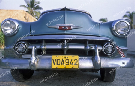 old cars in the old townl of the city of Havana on Cuba in the caribbean sea.