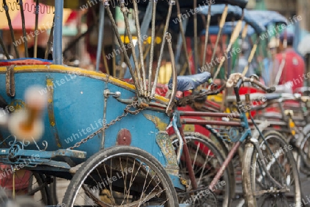 Bicycle Ricksha Taxis at the morning Market in Nothaburi in the north of city of Bangkok in Thailand in Southeastasia.