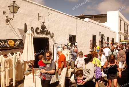 the sunday market in the old town of Teguise on the Island of Lanzarote on the Canary Islands of Spain in the Atlantic Ocean. on the Island of Lanzarote on the Canary Islands of Spain in the Atlantic Ocean.
