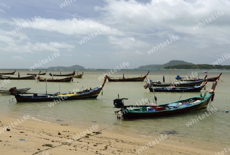 Der Strand in Rawai Beach im sueden der Insel Phuket im sueden von Thailand in Suedostasien.