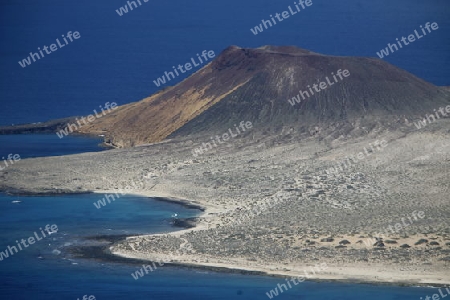 The  Isla Graciosa from the Mirador del Rio viewpoint on the Island of Lanzarote on the Canary Islands of Spain in the Atlantic Ocean. on the Island of Lanzarote on the Canary Islands of Spain in the Atlantic Ocean.
