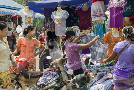 a shop at a marketstreet in the City of Mandalay in Myanmar in Southeastasia.