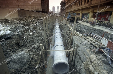  working people in the construction in the City of Shanghai in china in east asia. 