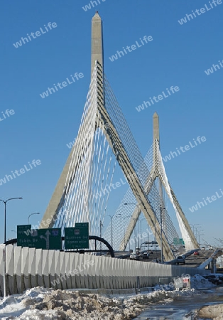 scenery with "Zakim Bunker Hill Bridge" in Boston (Massachusetts, USA) at winter time in sunny ambiance