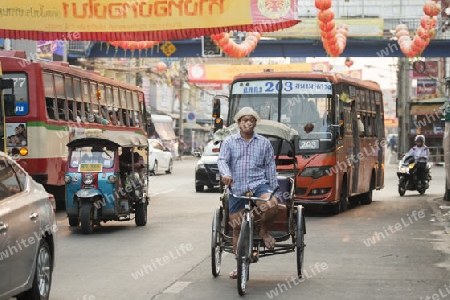 Bicycle Ricksha Taxis at the morning Market in Nothaburi in the north of city of Bangkok in Thailand in Southeastasia.