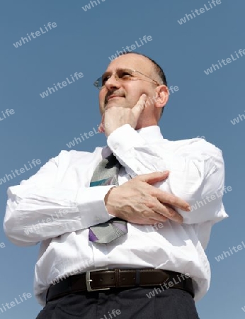 thoughtful businessman with sunglasses and beart