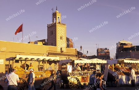 The Streetfood and Nightlife at the Djemma del Fna Square in the old town of Marrakesh in Morocco in North Africa.
