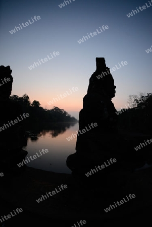 The Bridge at the Angkor Tom Gate in the Temple City of Angkor near the City of Siem Riep in the west of Cambodia.