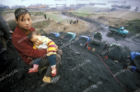 the coal workers in the village of fengjie in the three gorges valley up of the three gorges dam project in the province of hubei in china.