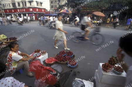 a streetmarket in the City of Shanghai in china in east asia. 