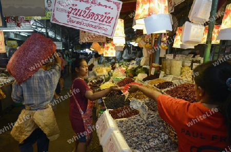 the food market at the Maeklong Railway Markt at the Maeklong railway station  near the city of Bangkok in Thailand in Suedostasien.