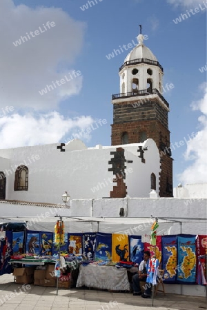 the sunday market in the old town of Teguise on the Island of Lanzarote on the Canary Islands of Spain in the Atlantic Ocean. on the Island of Lanzarote on the Canary Islands of Spain in the Atlantic Ocean.
