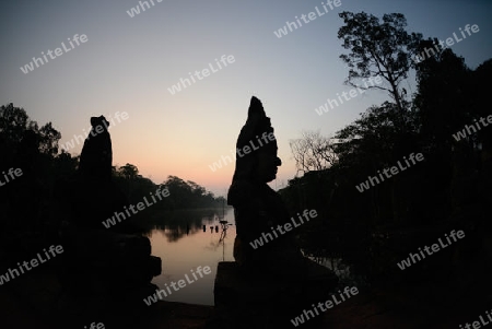 The Bridge at the Angkor Tom Gate in the Temple City of Angkor near the City of Siem Riep in the west of Cambodia.