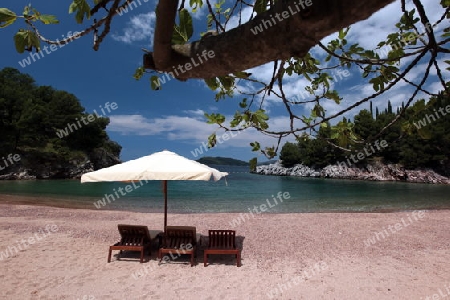 Ein Strand bei Sveti Stefan an der Mittelmeer Kueste in Montenegro im Balkan in Osteuropa.