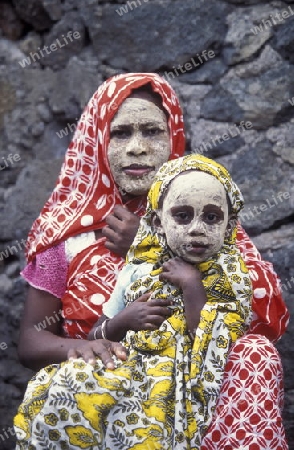 a women in the city of Moutsamudu on the Island of Anjouan on the Comoros Ilands in the Indian Ocean in Africa.   