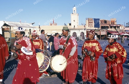 Traditional Music player at the Djemma del Fna Square in the old town of Marrakesh in Morocco in North Africa.
