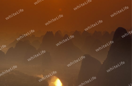 the landscape at the Li River near Yangshou near the city of  Guilin in the Province of Guangxi in china in east asia. 